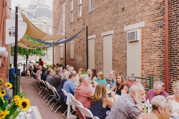 Diners enjoying Meals at the Market.