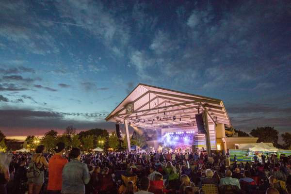 A Crowd Enjoying A Night Concert