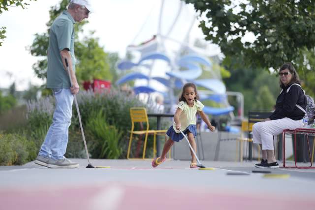 Kid playing at Monon Trail