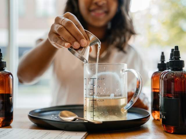 Candle pouring at Penn & Beech's Customer Fragrance Experience.