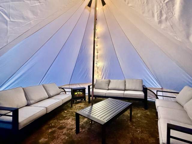 Seating inside a yurt rental at Spencer Farm Winery.