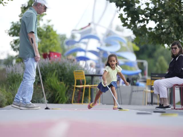 Kid playing at Monon Trail
