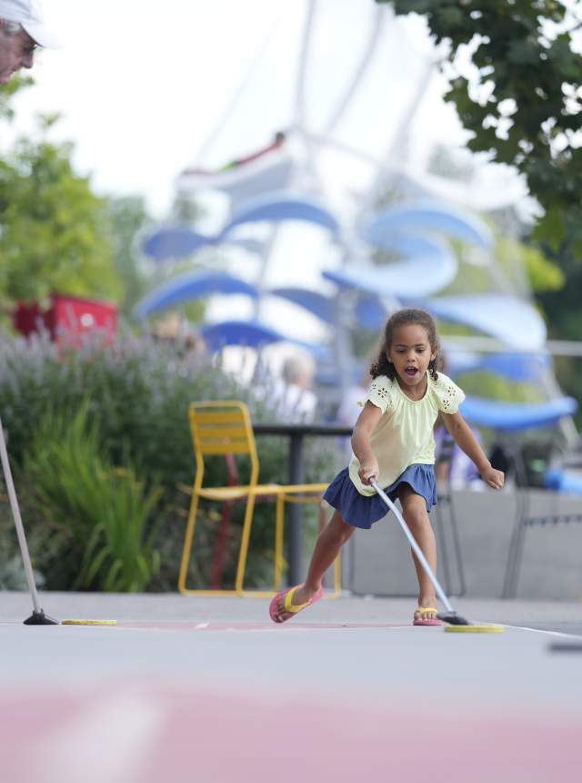 Kid playing at Monon Trail