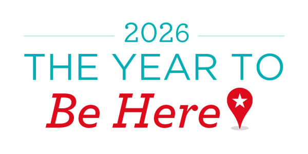 White graphic reading ‘2026 The Year to Be Here,’ with teal text for ‘2026’ and ‘The Year to’ and red script text for ‘Be Here,’ accompanied by a red location pin icon with a white star.