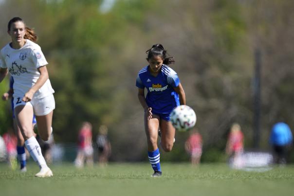 US Soccer Tournament player mid-game.