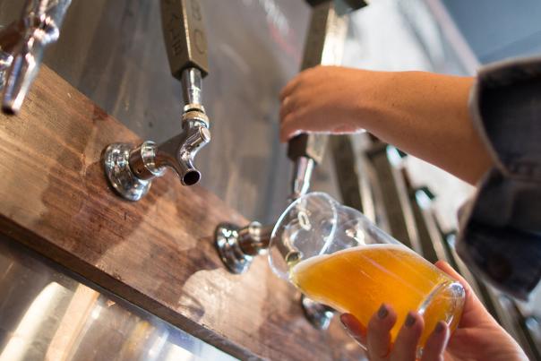 Close up of a beer being poured from a tap