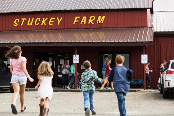 4 Kids Walking Toward the Entrance of Stuckey Farm Market