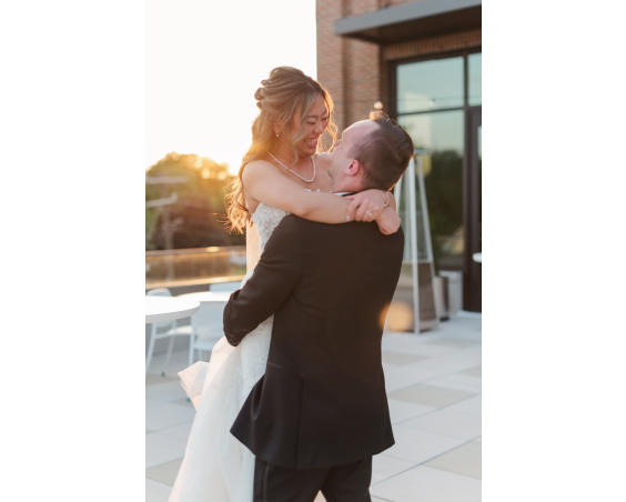 Happy couple on the Hendricks Live! patio (Sarah Elizabeth Photos, LLC).