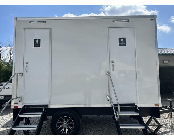 Mobile trailer restroom from Love's Restroom Rentals.