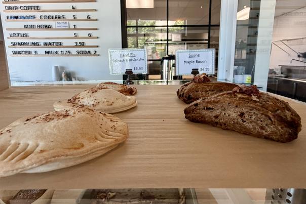 Handpies and other baked goods on a counter at BrewLab’s Mama Bird Bakery & Cafe