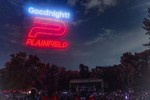 Drones form the word, "Goodnight" with the Plainfield town logo at the end of the Plainfield Sky Dance drone show during the Quaker Days Festival