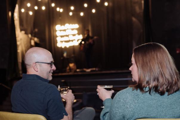 Couple listening to live entertainment at The Prewitt Restaurant + Lounge
