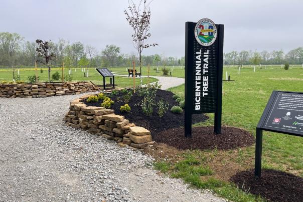 Hendricks County Bicentennial Tree Trail entryway with signs and stone landscaping at W.S. Gibbs Memorial Park