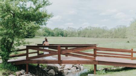 The beautiful bridge over the brook that runs through Ash & Oak's pasture.