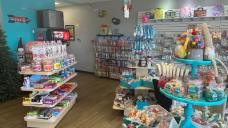 Colorful displays fill The Fudge Kettle's storefront