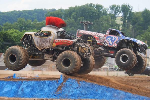Monster Trucks Raminator and Maximus in a competition at Four Wheel Jamboree