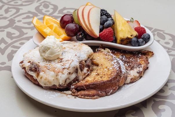 Cinnamon roll French toast breakfast at Bread Basket Cafe & Bakery
