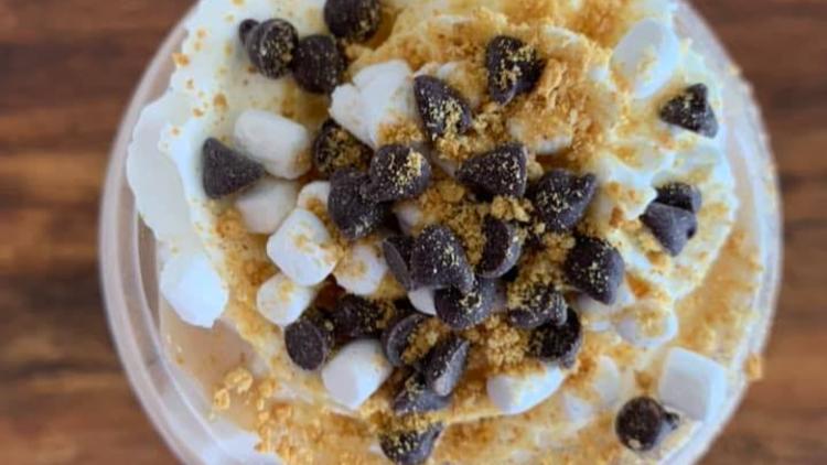 Protein coffee topped with whipped cream, chocolate chips, marshmallows, and graham cracker crumbles at The Energy Spot in Plainfield.