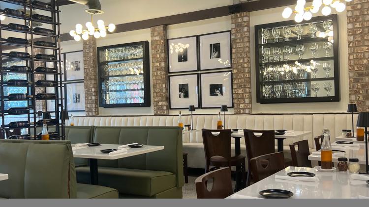 Interior of Sal's with tables and booths.