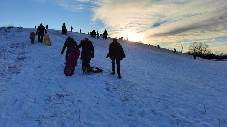 Sledding at W.S. Gibbs Memorial Park in Avon