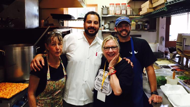 Perillo's Pizzeria owners love their customers! Damiano Perillo is in the white shirt.