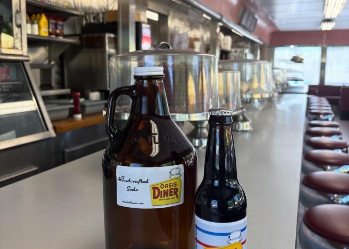 Oasis Diner’s handcrafted soda displayed on their dining counter.
