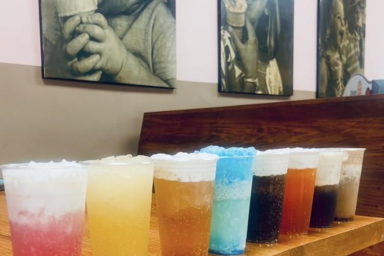 A variety of dirty sodas arranged on a table at Danville Dips