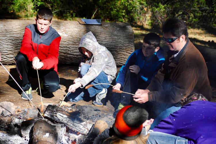 Bring some hot dogs and marshmallows to roast over the campfire!