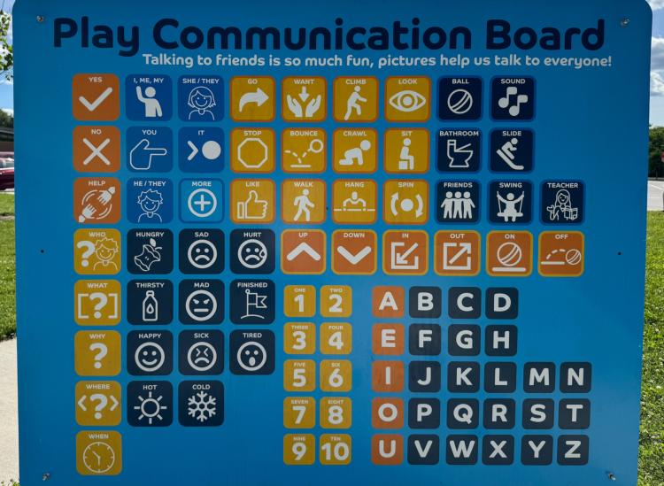 Inclusive play communication board at Murphy Aquatic Park in Avon, Indiana, helping children of all abilities communicate and participate in park activities.