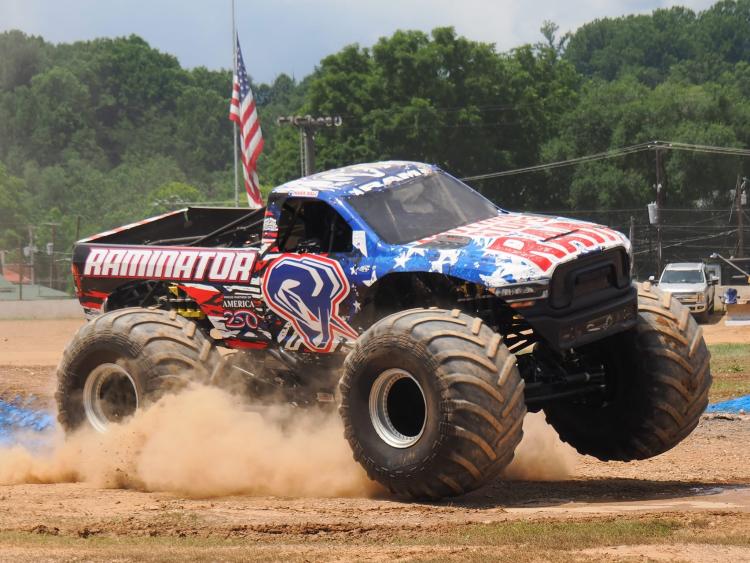 Raminator monster truck with wheels off the ground at the Four Wheel Jamboree