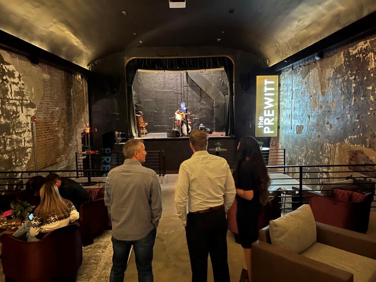 The Prewitt lounge area and stage with live entertainment in Plainfield