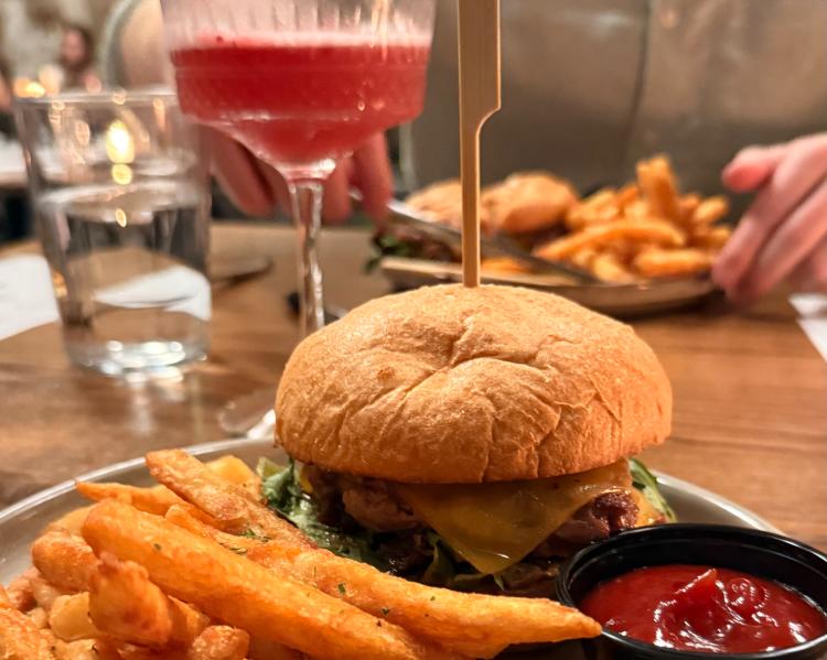 A burger and cocktail from The Prewitt Restaurant and Lounge in Plainfield, IN