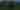 Green mountains with a tree standing out