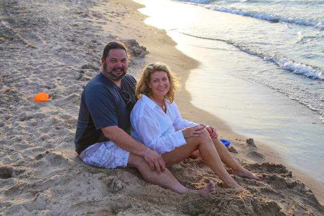 Couple sitting on the beach