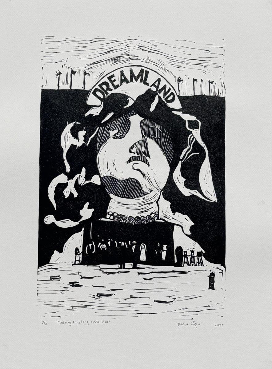 A black and white print with a woman's face and "Dreamland" in a banner above her.