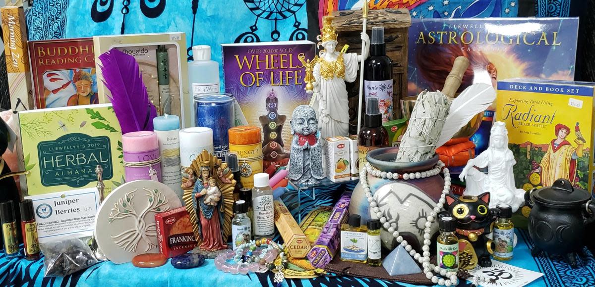 Display of crystals, books, incense, candles, tarot decks, and other unique gifts at Blue Butterfly New Age in Portage, Indiana.