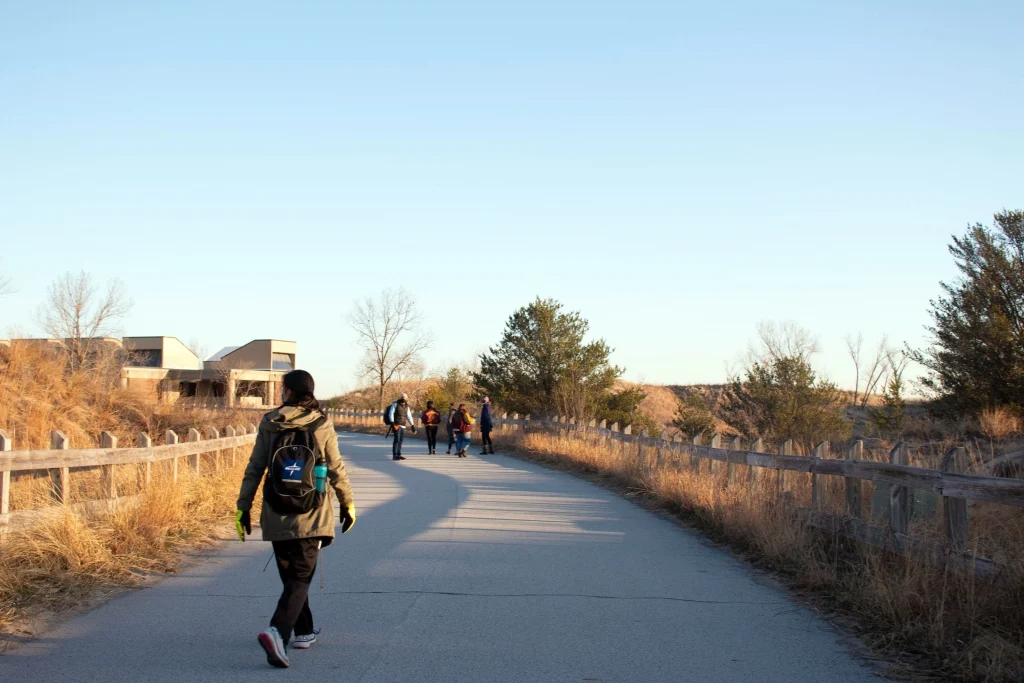 Students walking on the bath house trail