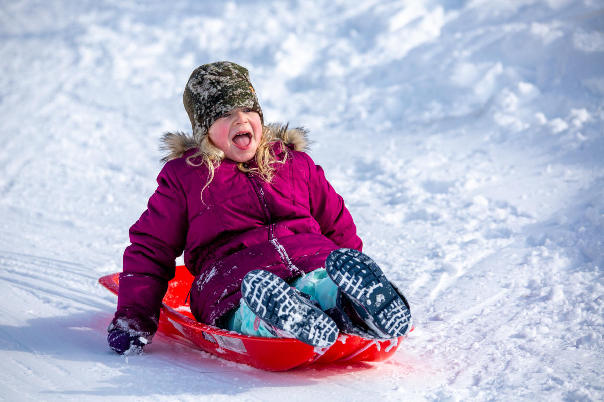 Girl Sledding Devil's Slide State Park