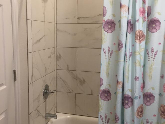 Porcelain tile bathroom in every apartment