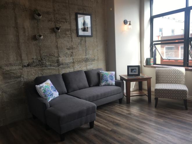 Living area in studio apartment 201