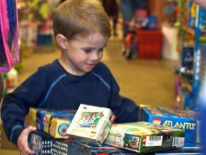 Happy little boy with Legos
