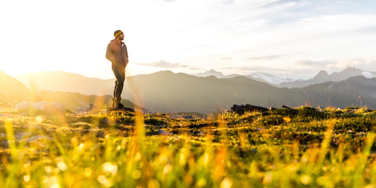 Man standing on hiking trail in Juneau