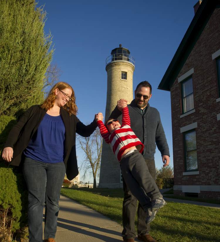 Family in front of Southport Lighthouse