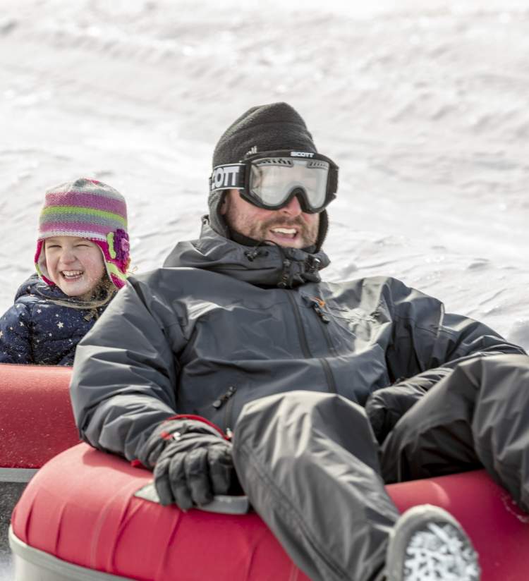Dad & Daughter snowtubing