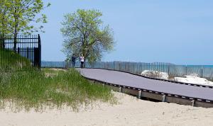 strolling on the Simmons Island Beach boardwalk