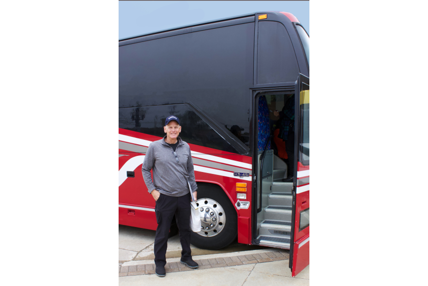 man beside bus - step-on tour