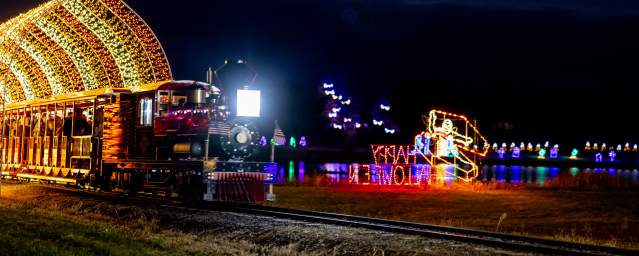 Train is going through the Halloween Light Show at Lakeland Orchard & Cidery