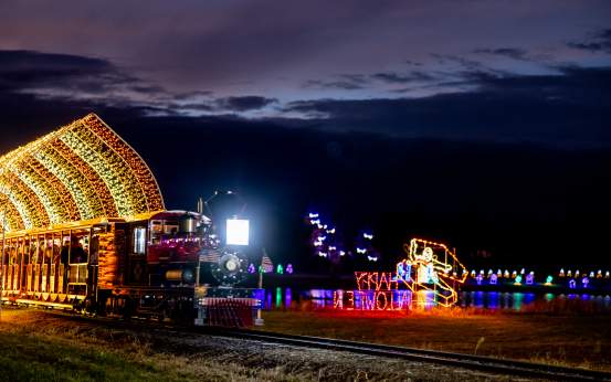 Train is going through the Halloween Light Show at Lakeland Orchard & Cidery