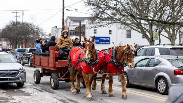 A horse-drawn carriage ride through Clarks Summit, PA, at the Clarks Summit Festival of Ice