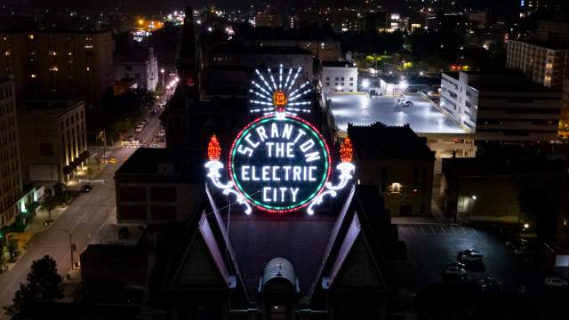 Electric City Sign at Lit Up at Night in Downtown Scranton, PA